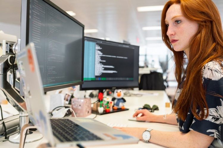 woman coding software
